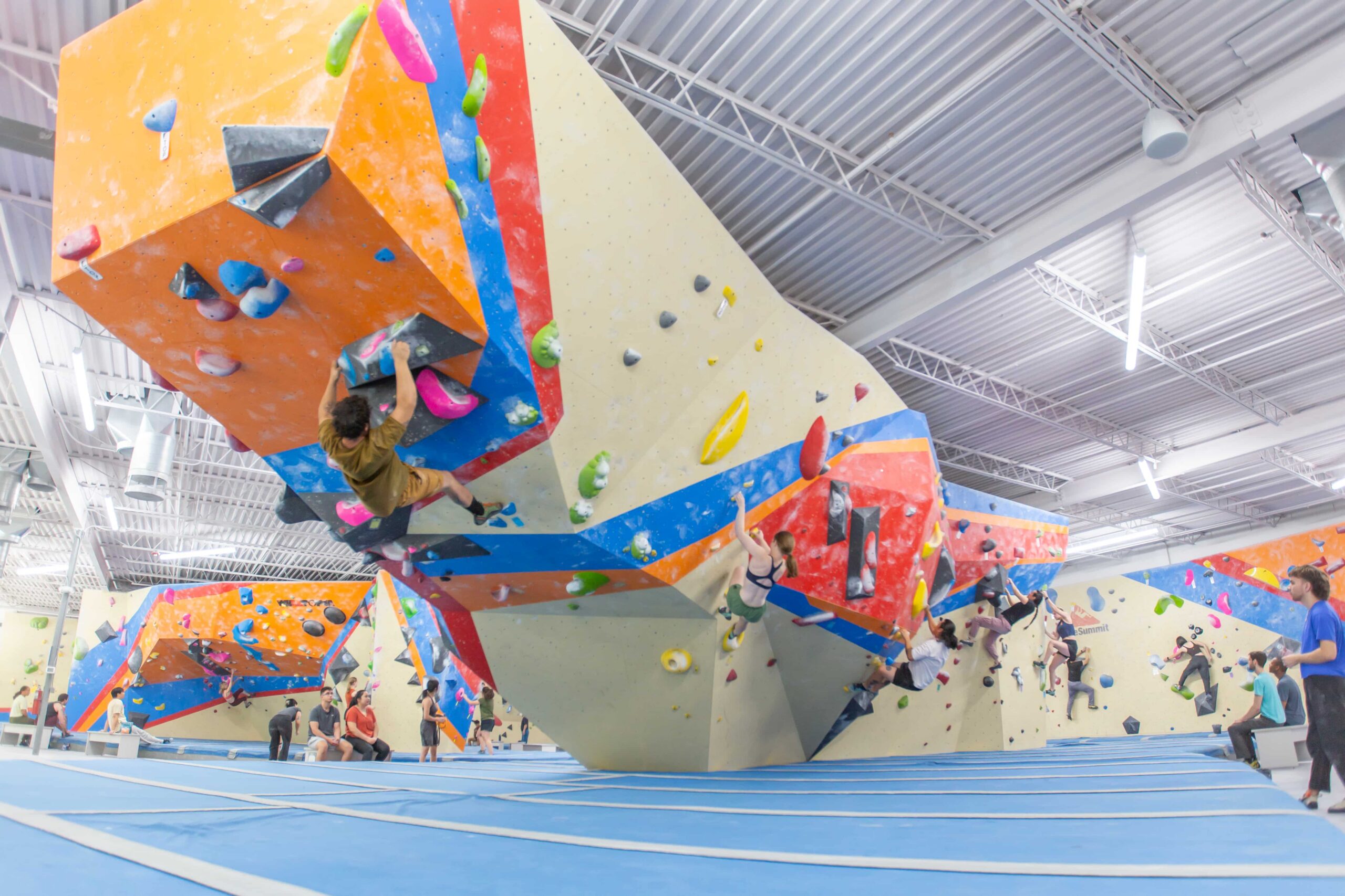 Climbers boulder on the prow portion of the wall.