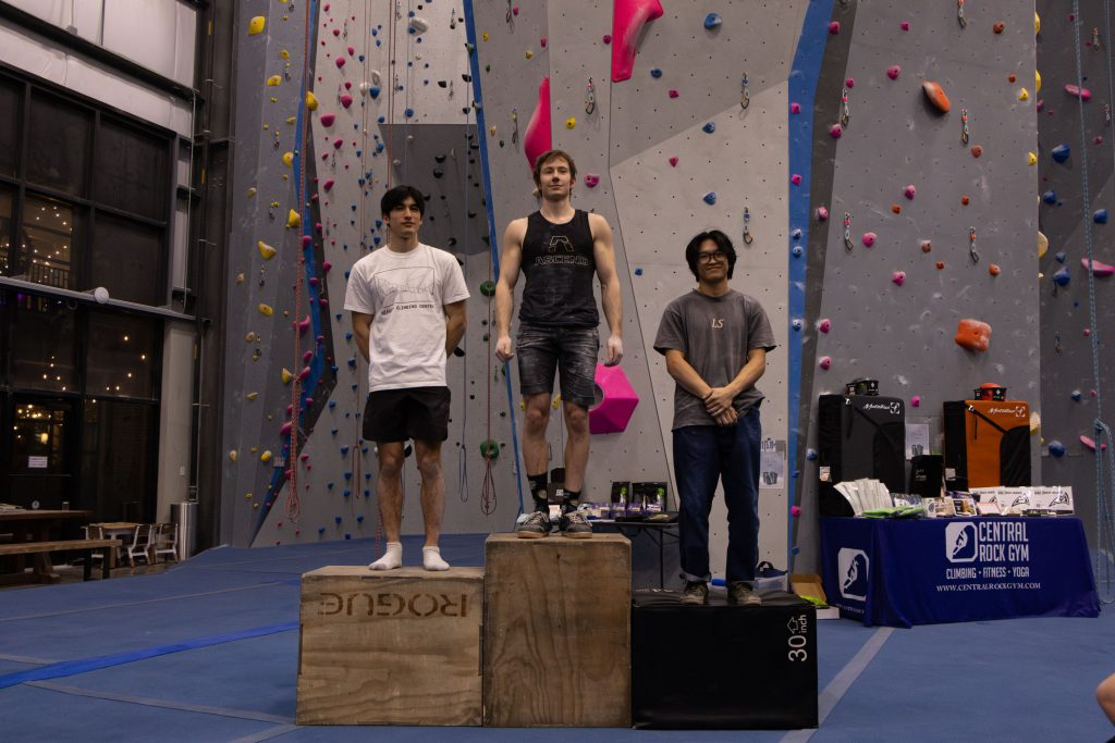 image of podium with 3 climbing competition winners at central rock gym buffalo
