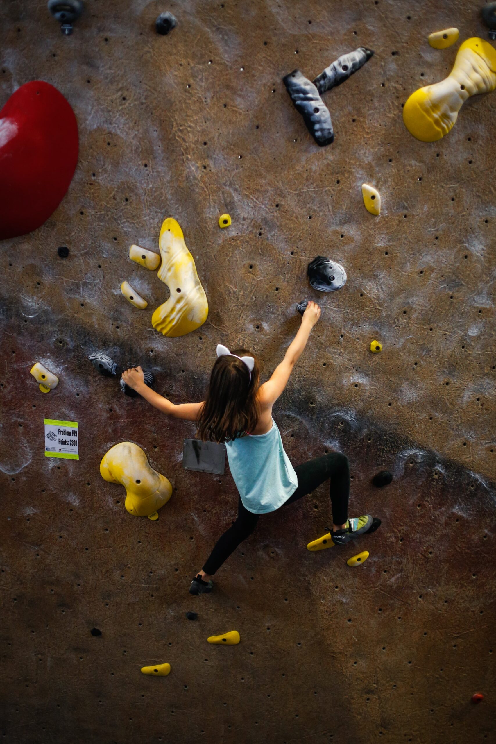 Photo of girl climbing on boulder at CRG Hadley