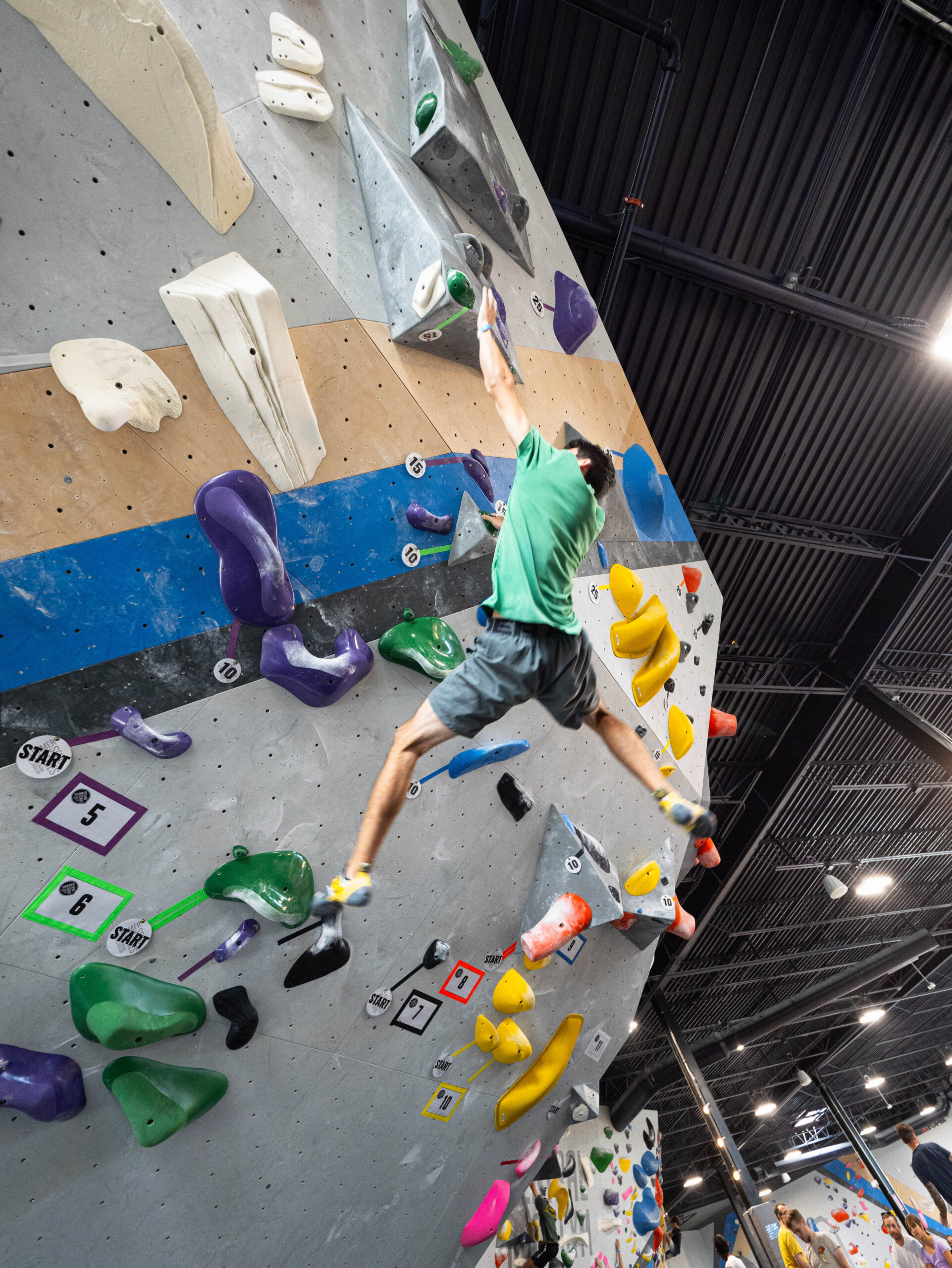 Man cuts feet while competing in the Summer Send Series at Central Rock Gym West Hartford