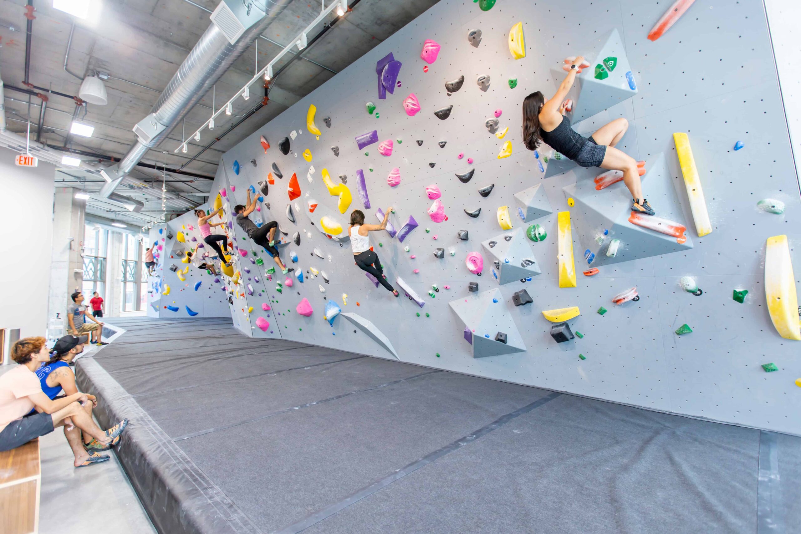 A group of people bouldering.