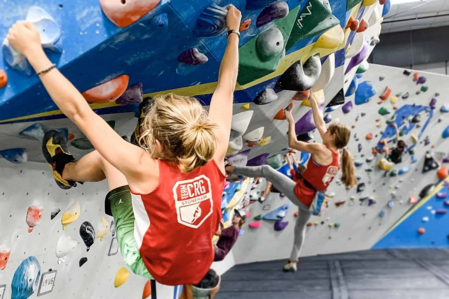 two girl competing against for another at Central Rock Gym