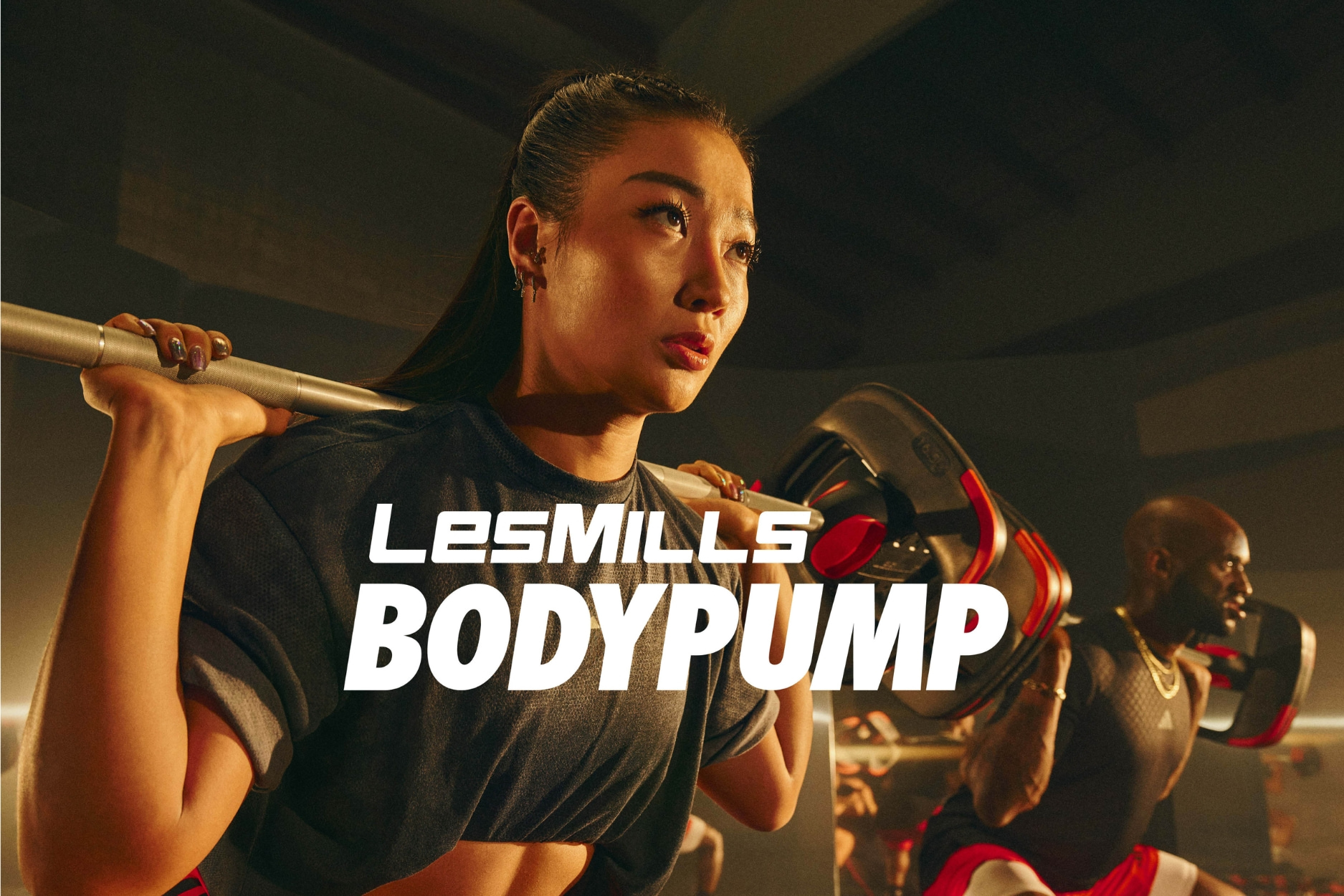 Les Mills Bodypump - girl doing workout.