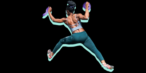 A woman is climbing with her left foot outstretched and smearing on the wall.
