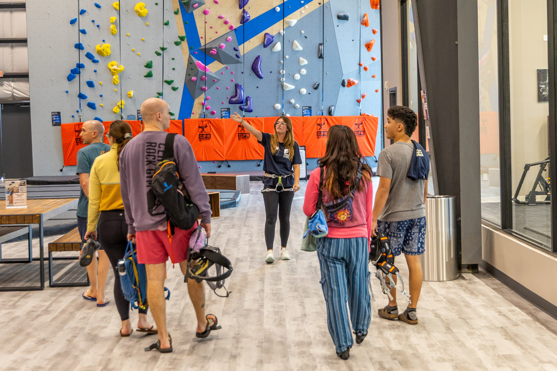 A CRG Staff Member gives a tour to a group of new climbers.