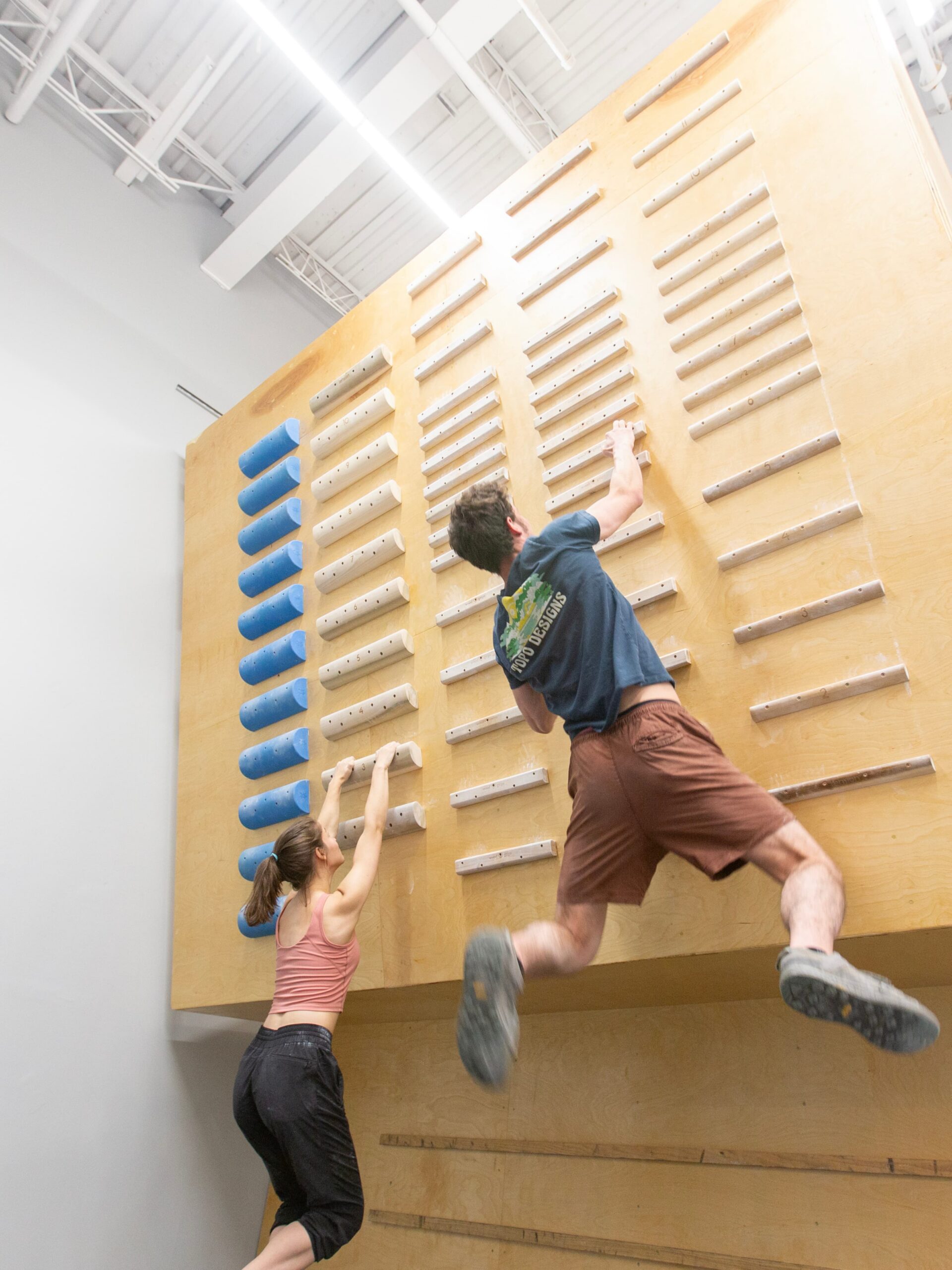 two people bouldering at central rock gym
