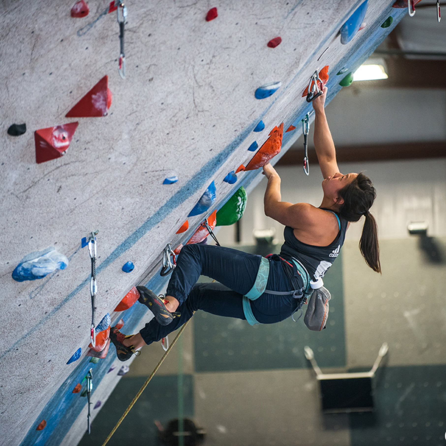 A women Top rope Top Rope climbing at Central Rock Gym