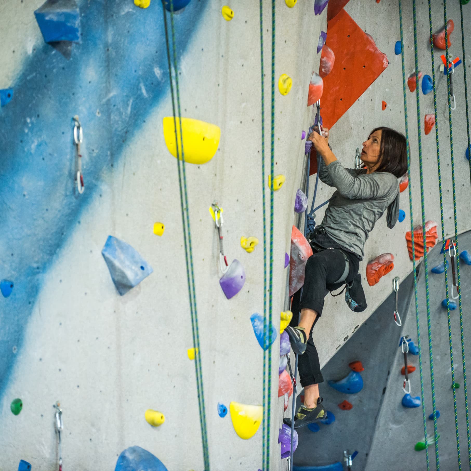 A girl Rope climbing at Central Rock Gym