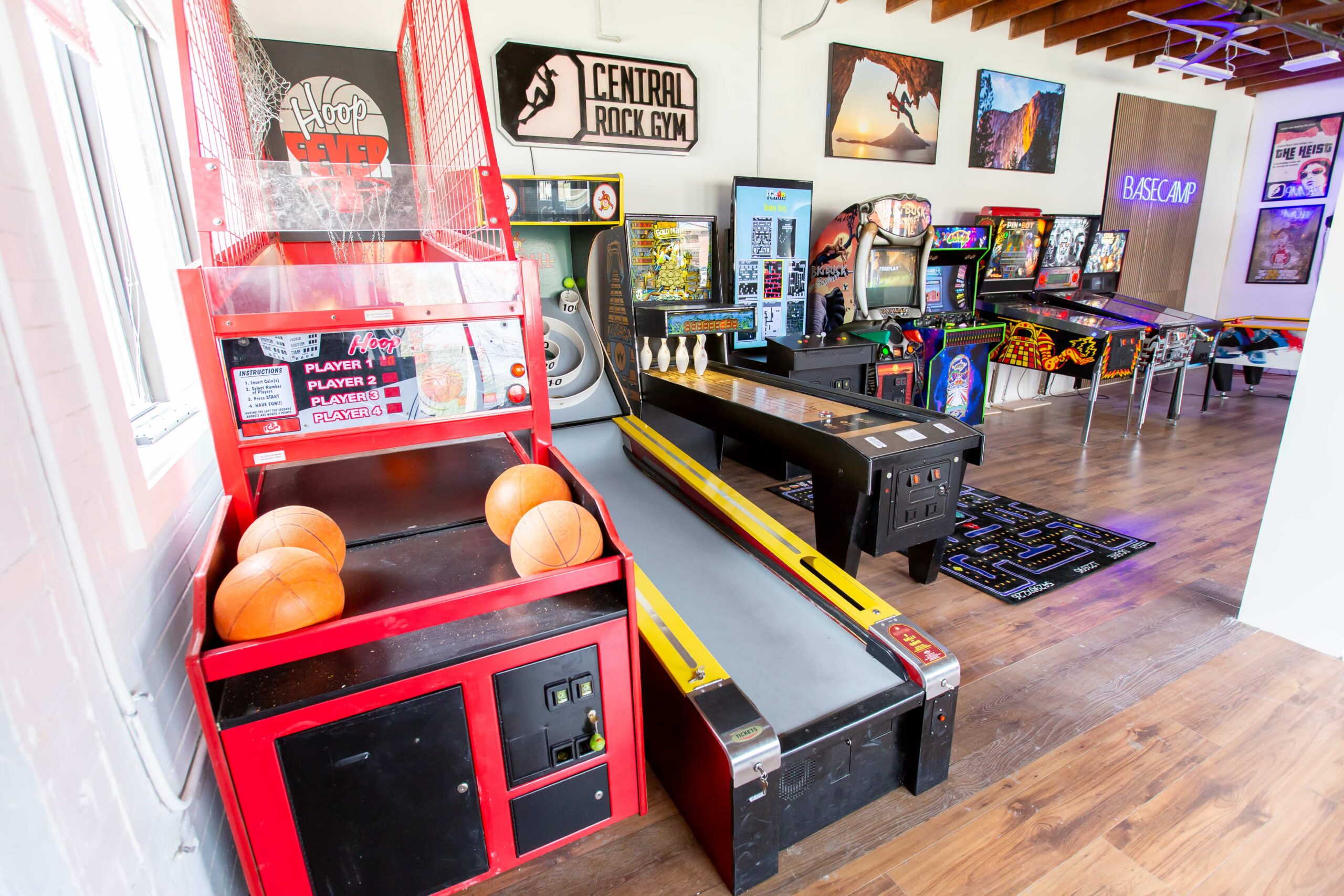 a area that includes arcades and a lounge at central rock gym
