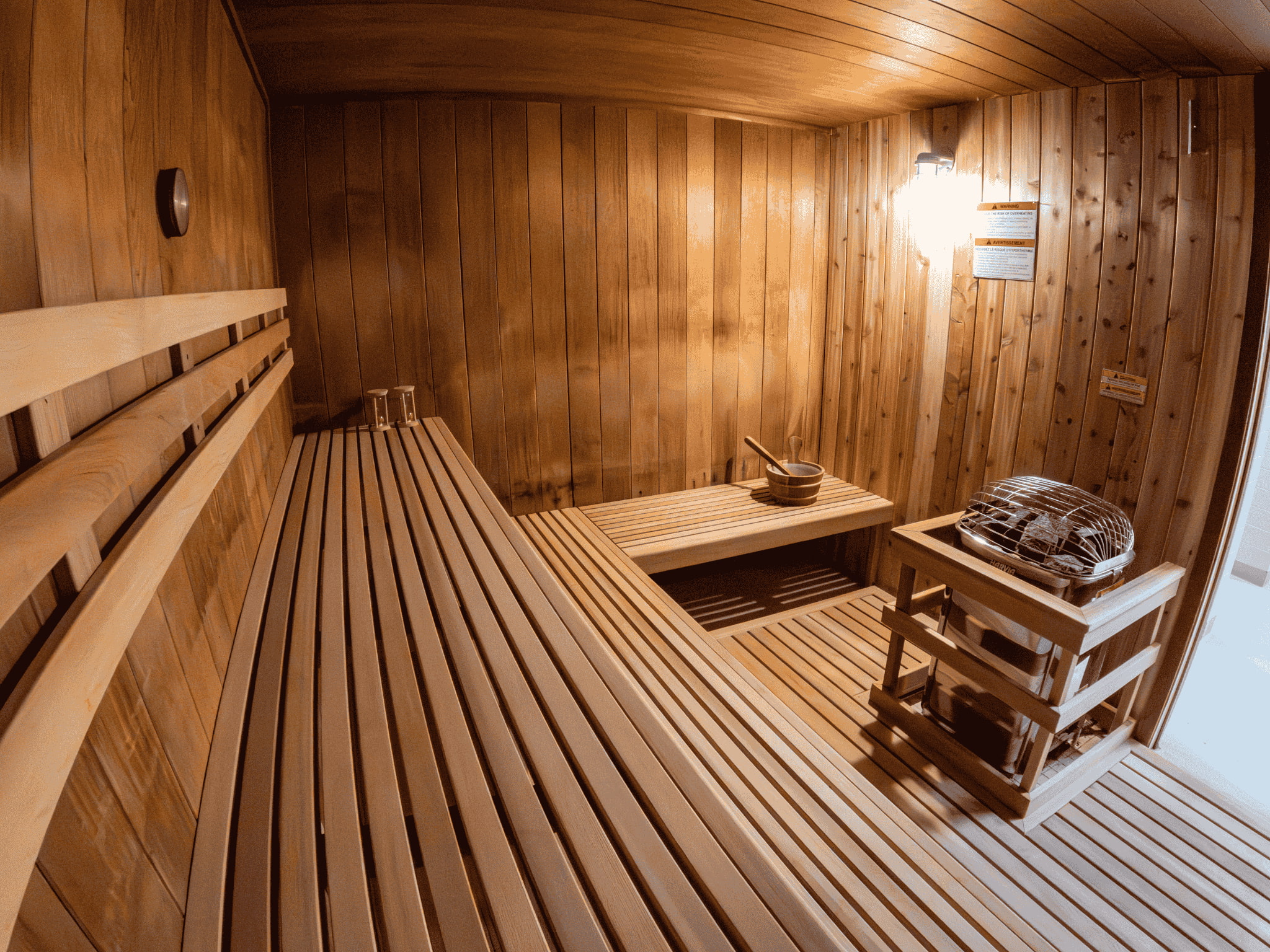 A traditional sauna with two levels of benches.